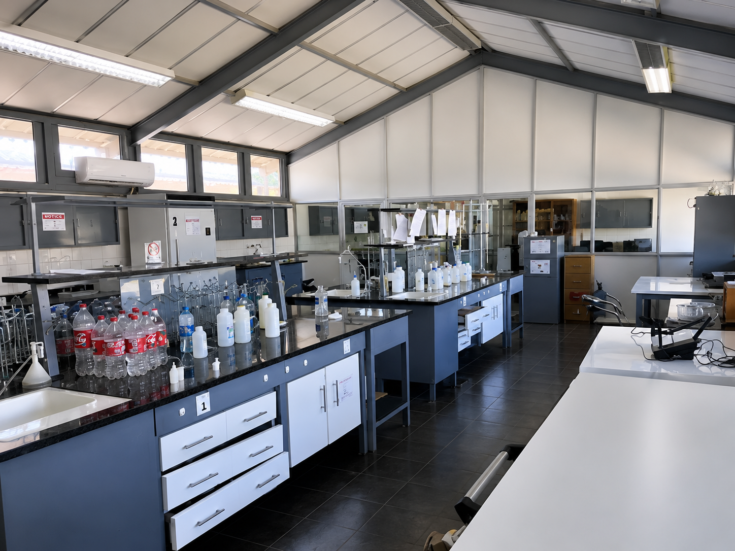 Black female scientist in water microbiology laboratory